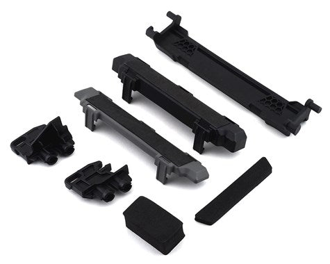Battery hold-down/ mounts (front & rear)/ battery compartment spacers/ foam pads