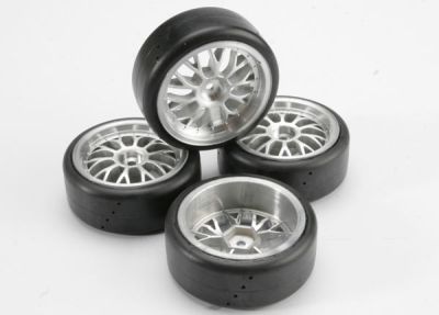 Tires Pro-Trax on-road (medium compound with contoured inserts) (mounted and glued to part #4872 wheels) (2 left 2 right)
