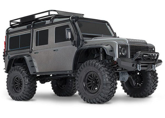 Discontinued - TRX-4 Scale and Trail™ Crawler with Land Rover Defender Body:  1/10 Scale 4WD Electric Trail Truck. Ready-to-Drive with TQi Traxxas Link™ Enabled 2.4GHz Radio System XL-5 HV ESC (fwd/rev) and Titan 550 motor.