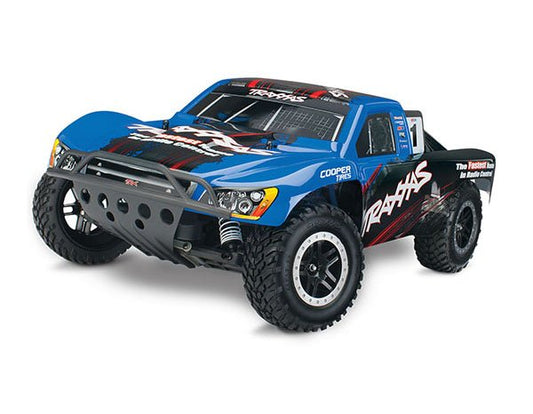 Nitro Slash: 1/10-Scale Nitro-Powered 2WD Short Course Racing Truck.  Ready-To-Race with TRX 3.3 Racing Engine EZ-Start electric starting system TQi Traxxas Link™ Enabled 2.4GHz radio system and Traxxas Stability Management (TSM). Includes: Battery and