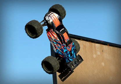 Discontinued - E-Revo VXL Brushless Orange and Blue  1/10 Scale 4WD Brushless Electric Monster Truck with TQi 2.4GHz Traxxas Link Enabled Radio System Velineon VXL-6s brushless ESC (fwd/rev) and Traxxas Stability Management (TSM)