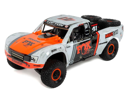 Discontinued - Unlimited Desert Racer:  4WD Electric Race Truck. Ready-to-Race with TQi 2.4GHz Traxxas Link™ Enabled Radio System Velineon VXL-6s brushless ESC (fwd/rev) and Traxxas Stability Management (TSM)